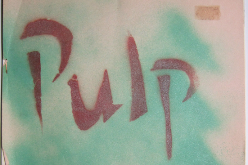 Detail of zine cover with stencilled title Pulp and green smudges on pink background